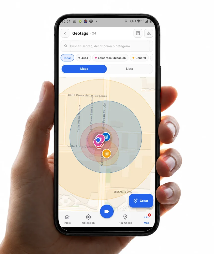 App Nextor Móvil mostrando el mapa de Geotags organizados por categoría, con búsqueda y botón Crear